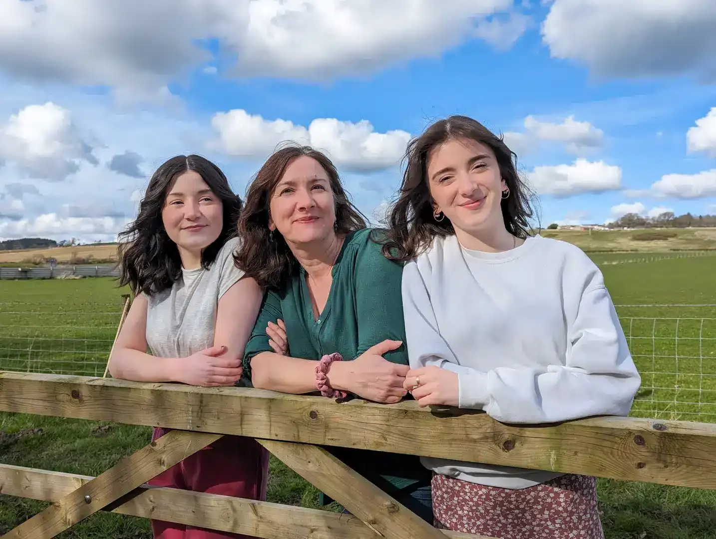 Sarah with family on the farm in Northumberland