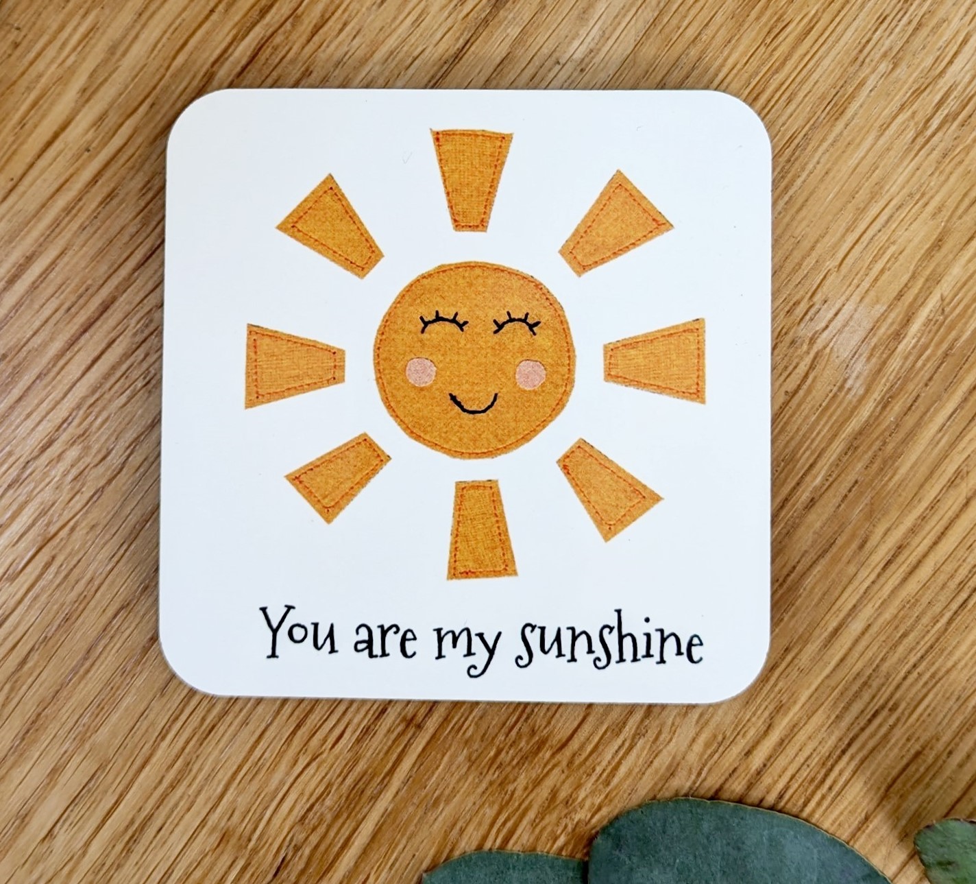 Coaster with the words You are my sunshine and image of a happy sun