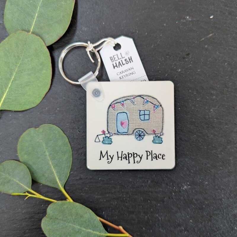 Square My Happy Place caravan keyring on slate with eucalyptus